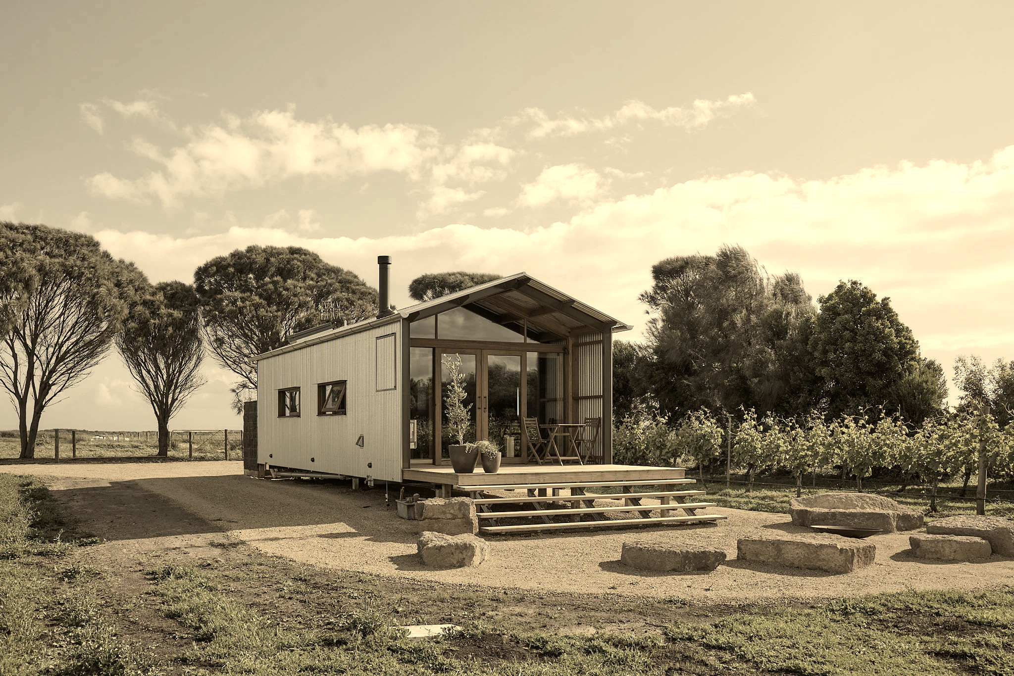 Ample Co. Weekender cabin exterior with deck and vineyard surrounds